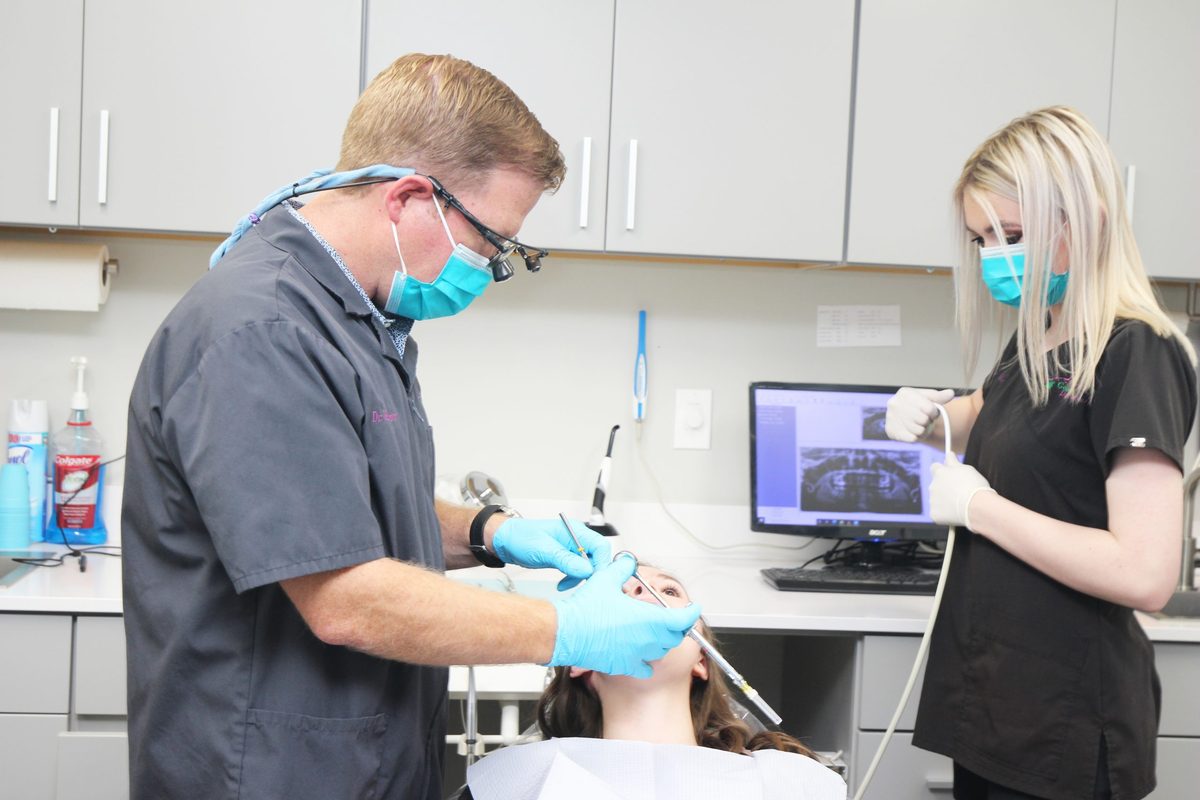 Dr. Brown treating a patient chairside