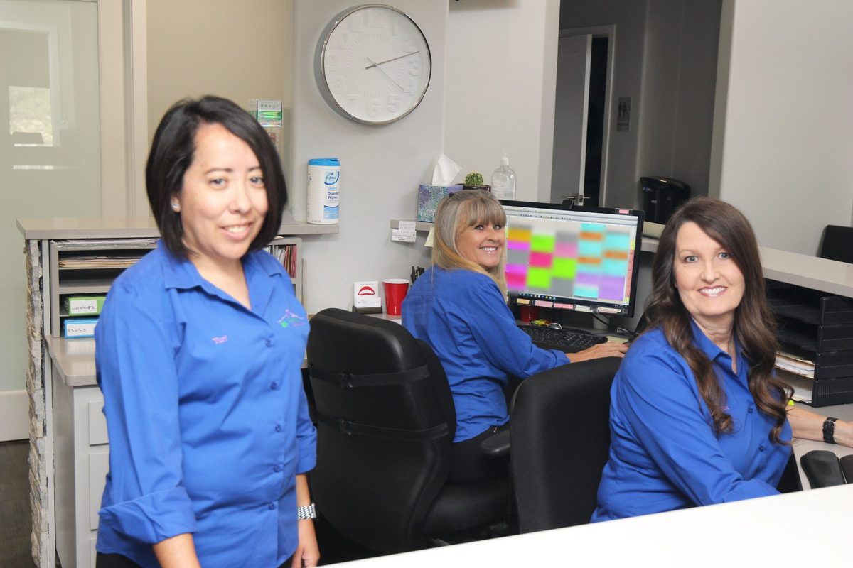 The Goodman Dental Care front desk team